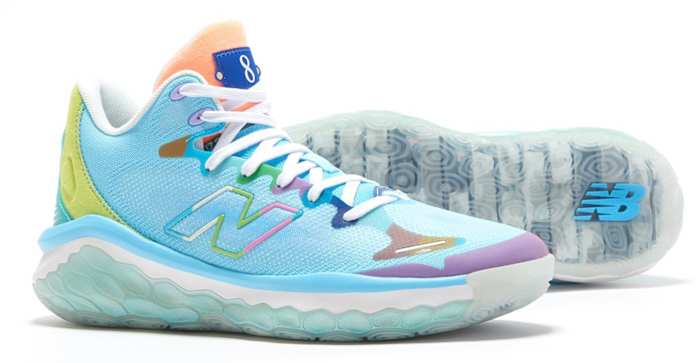 View of blue and white New Balance shoes.